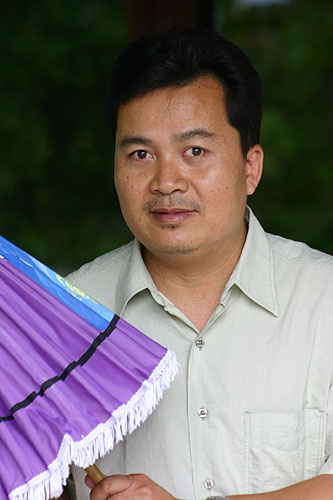 Saa Paper Parasol in Red with Gold Accents from Thailand - Motifs on Red