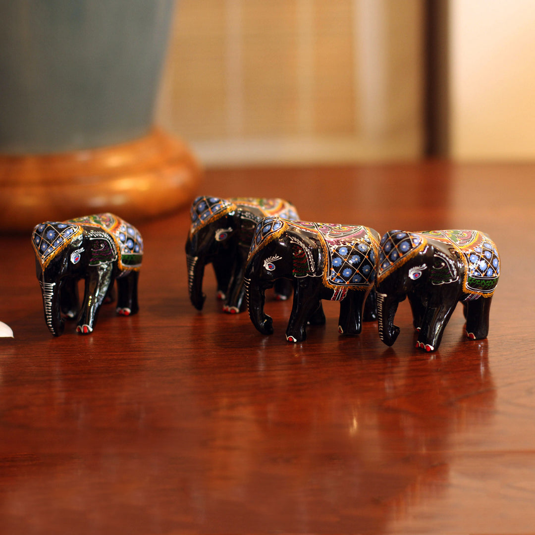 Four Young Elephants