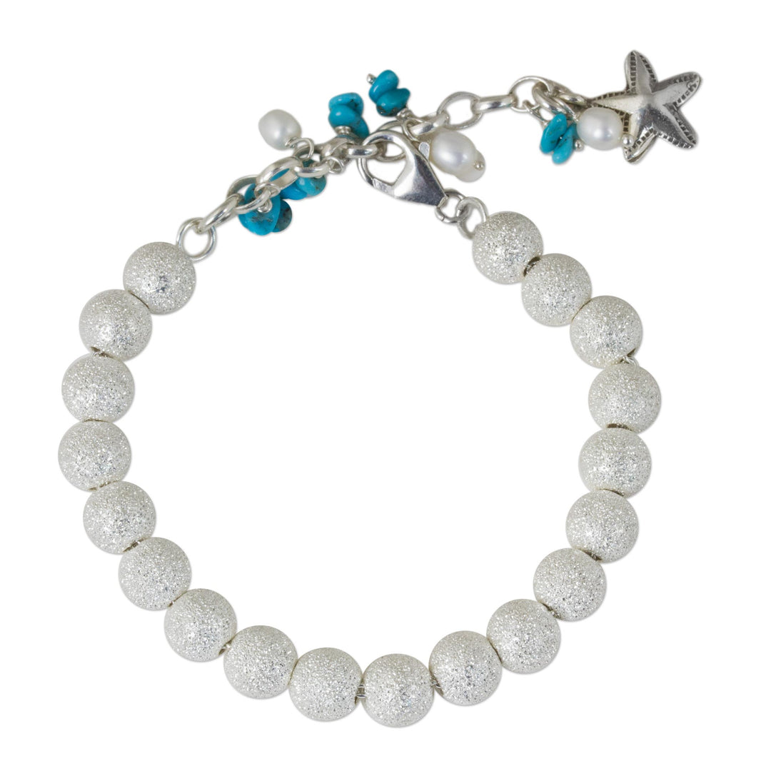 Artisan Crafted Silver Bracelet with Starfish Charm - Sparkling Waves
