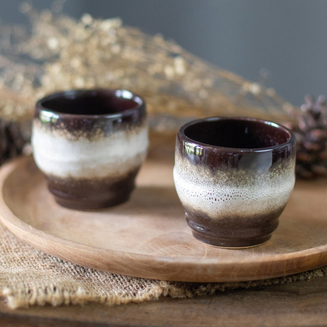 Set of 2 Handcrafted Brown and White Ceramic Cups from Bali - Serene Flavors