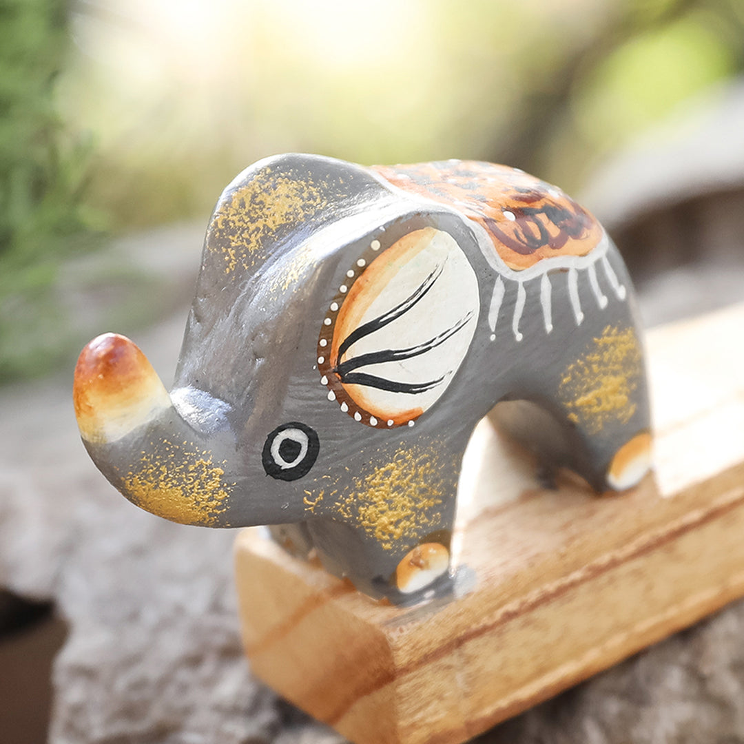 Handcrafted Elephant-Themed Grey Jempinis Wood Door Stopper - Tiny Giant