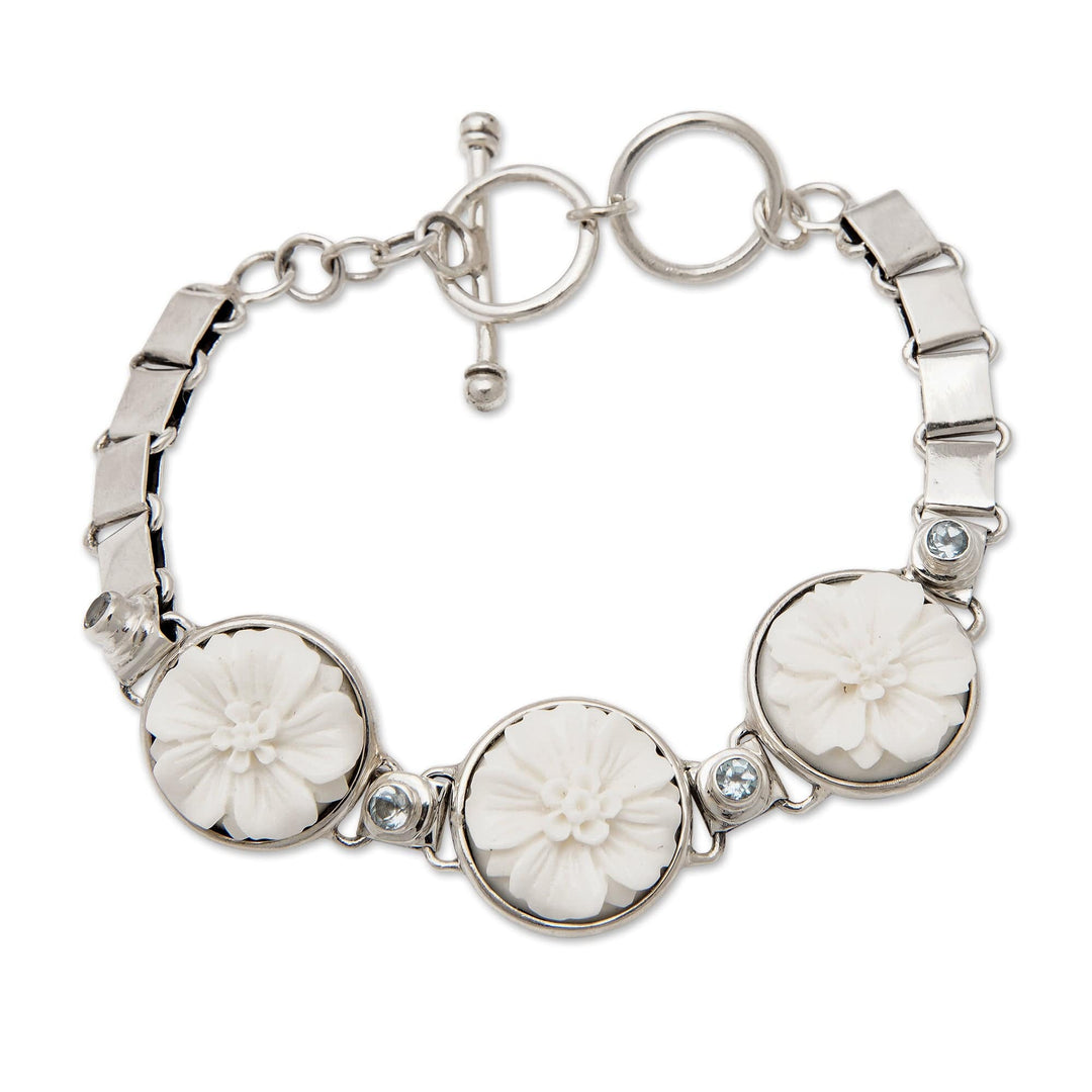 Floral Sterling Silver and Blue Topaz Pendant Bracelet - Celestial Blossoming