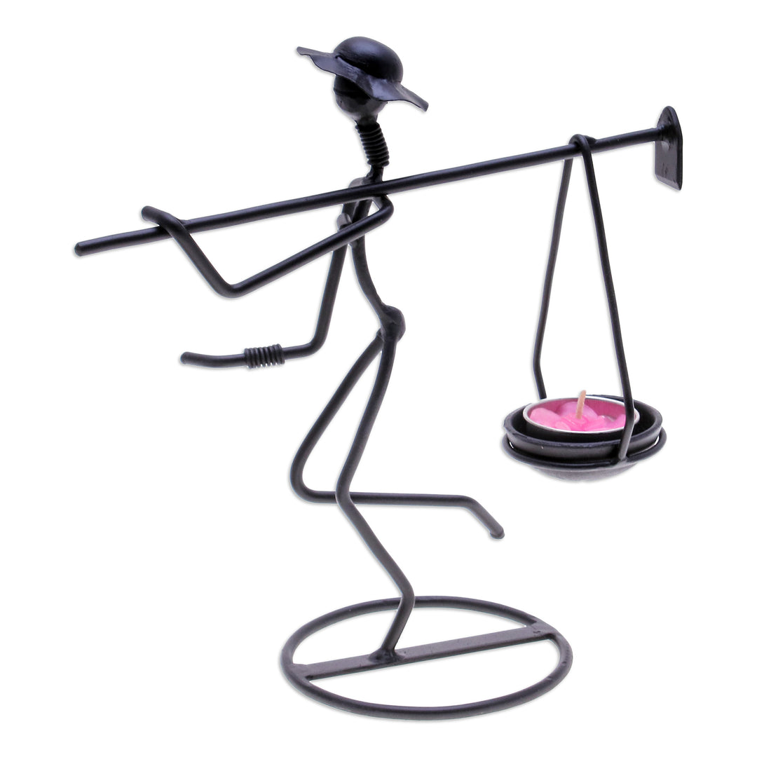 Modern Iron Tealight Holder of Man Carrying Weight in Black - On my Way