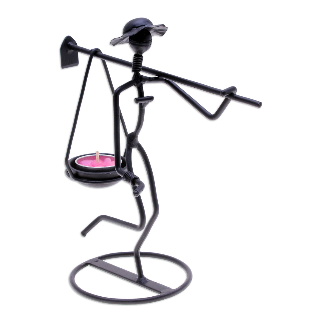 Modern Iron Tealight Holder of Man Carrying Weight in Black - On my Way
