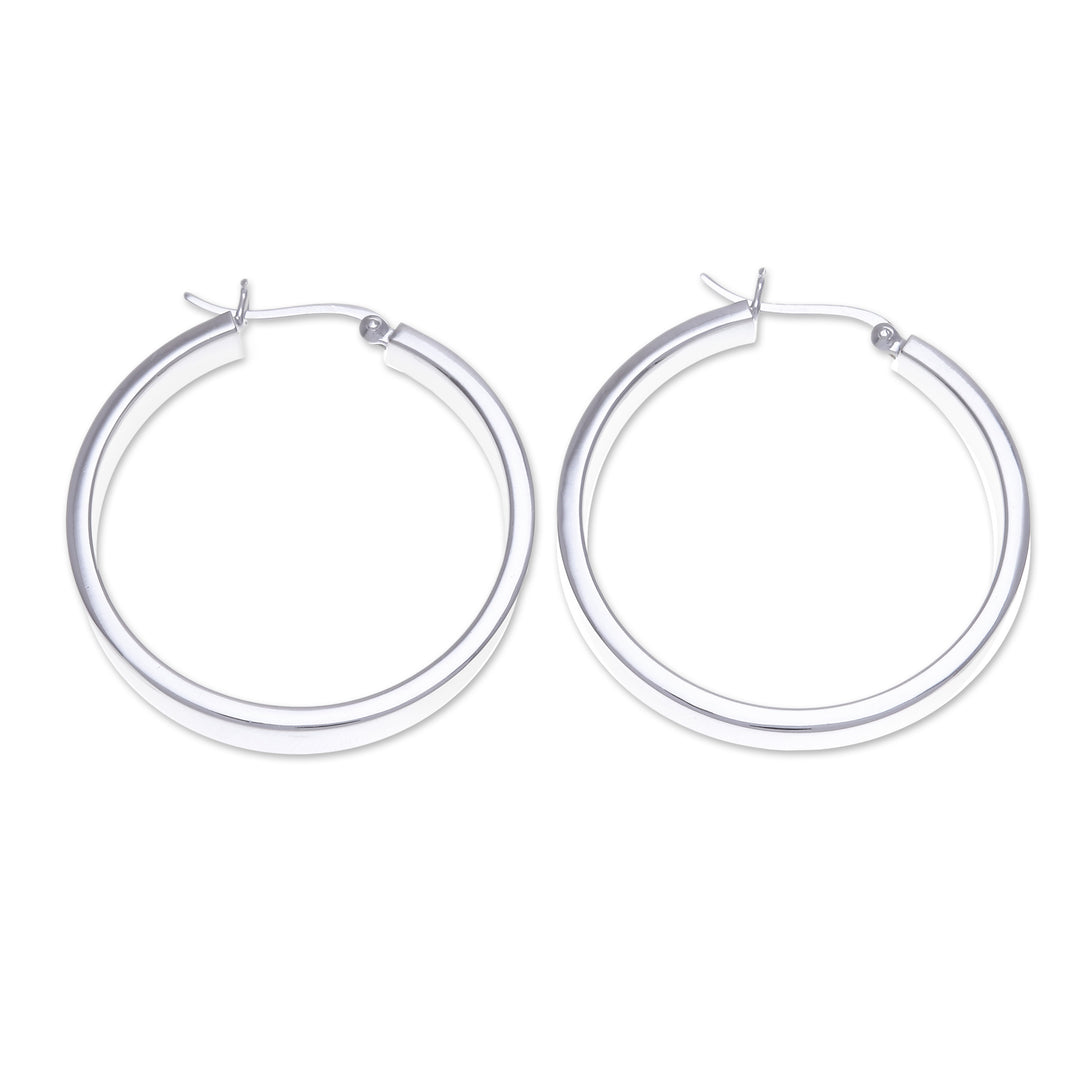 Minimalist-Inspired Polished Sterling Silver Hoop Earrings - One Thought