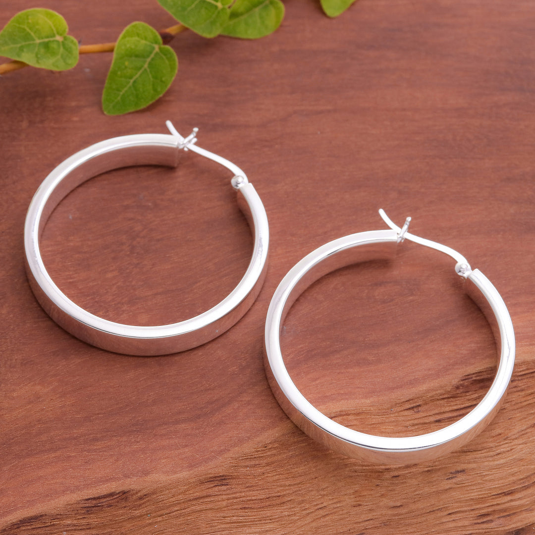 Minimalist-Inspired Polished Sterling Silver Hoop Earrings - One Thought