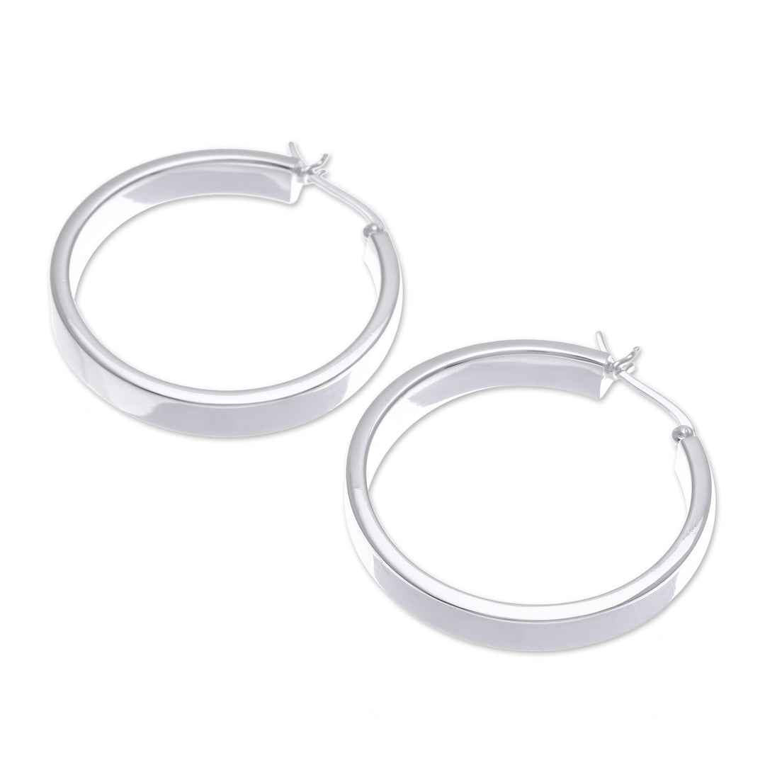 Minimalist-Inspired Polished Sterling Silver Hoop Earrings - One Thought