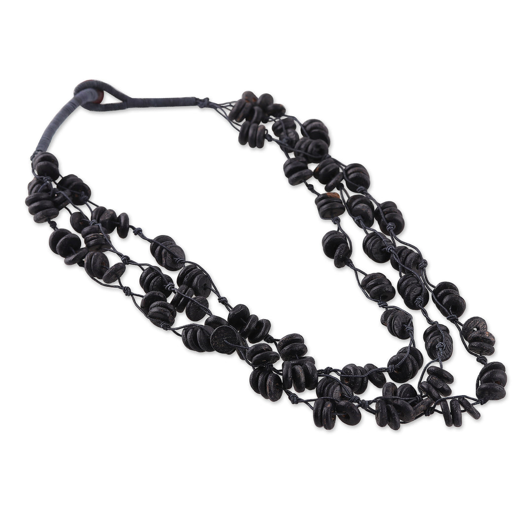 Handcrafted Haldu Wood Beaded Three-Strand Necklace in Black - Midnight Loops