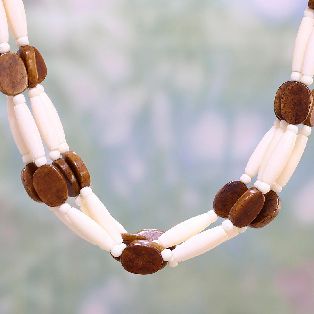 Handcrafted Brown and White Bone Beaded Necklace - Earth's Light