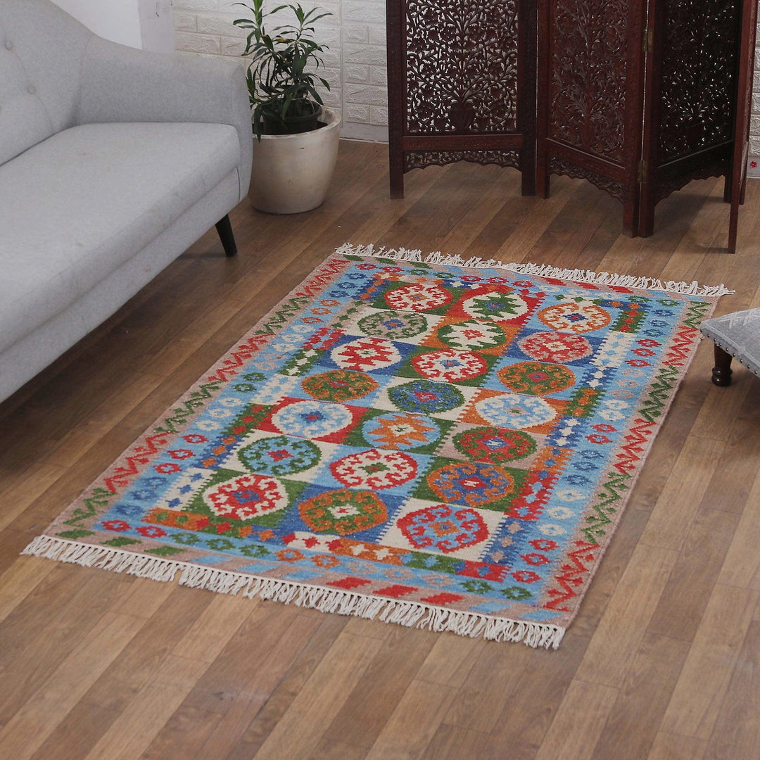 Handloomed Traditional Diamond-Patterned Wool Rug from India - Creative Blue
