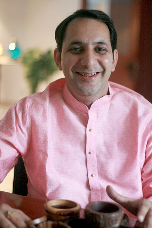 Set of 4 Mango Wood Orange Bangle Bracelets from India - Orange Fusion