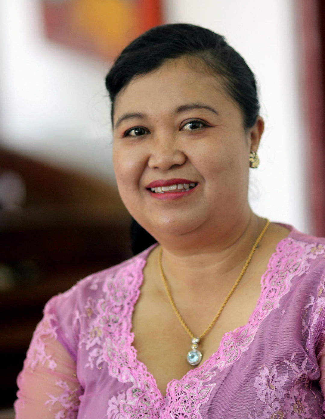 Silver Pendant Necklace with One-Carat Blue Topaz Gemstone - Bird Nest