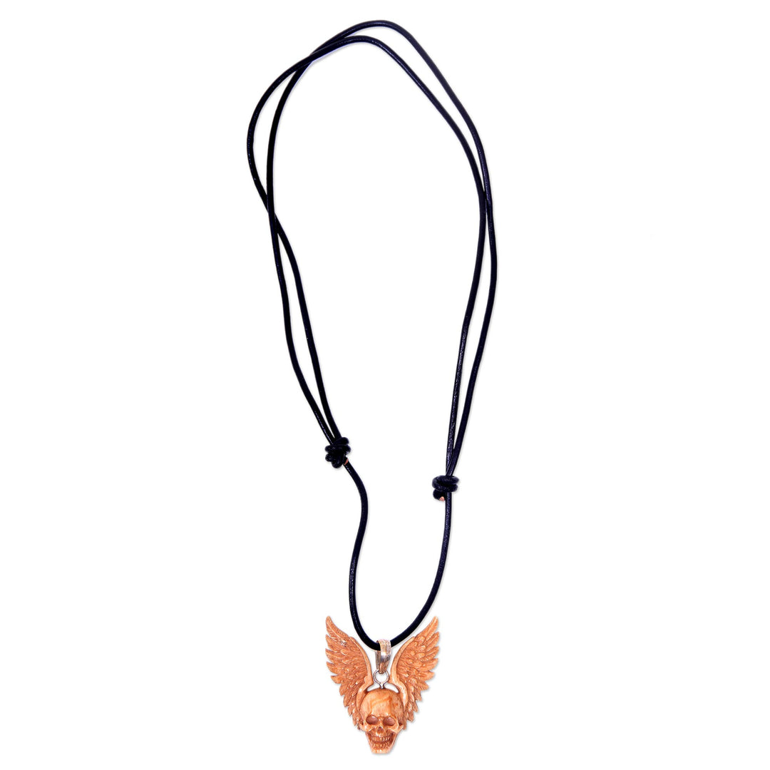 Hand Carved Bone Pendant Necklace of a Skull from Indonesia - Flying Skull
