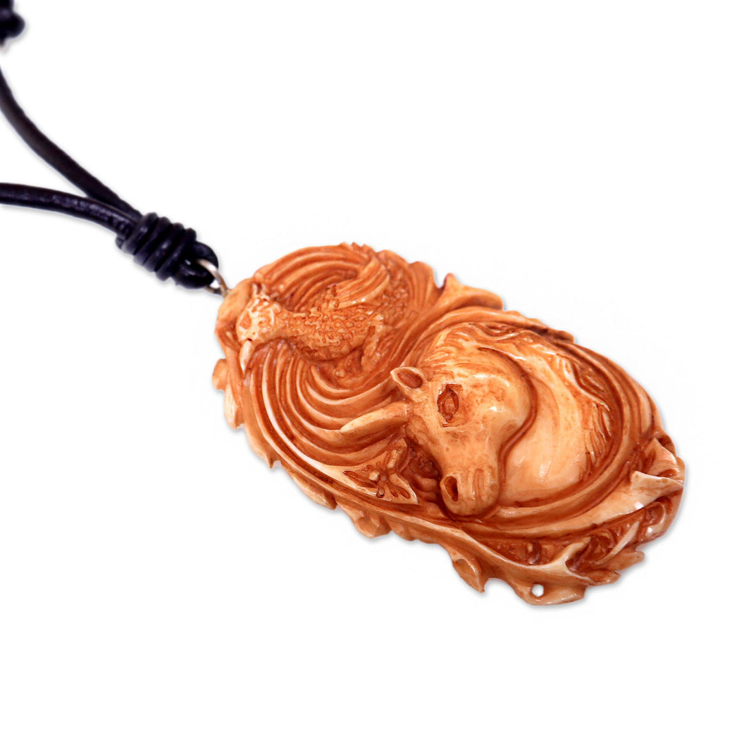 Artisan Crafted Unicorn Necklace in Bone on a Leather Cord - Unicorn and Phoenix