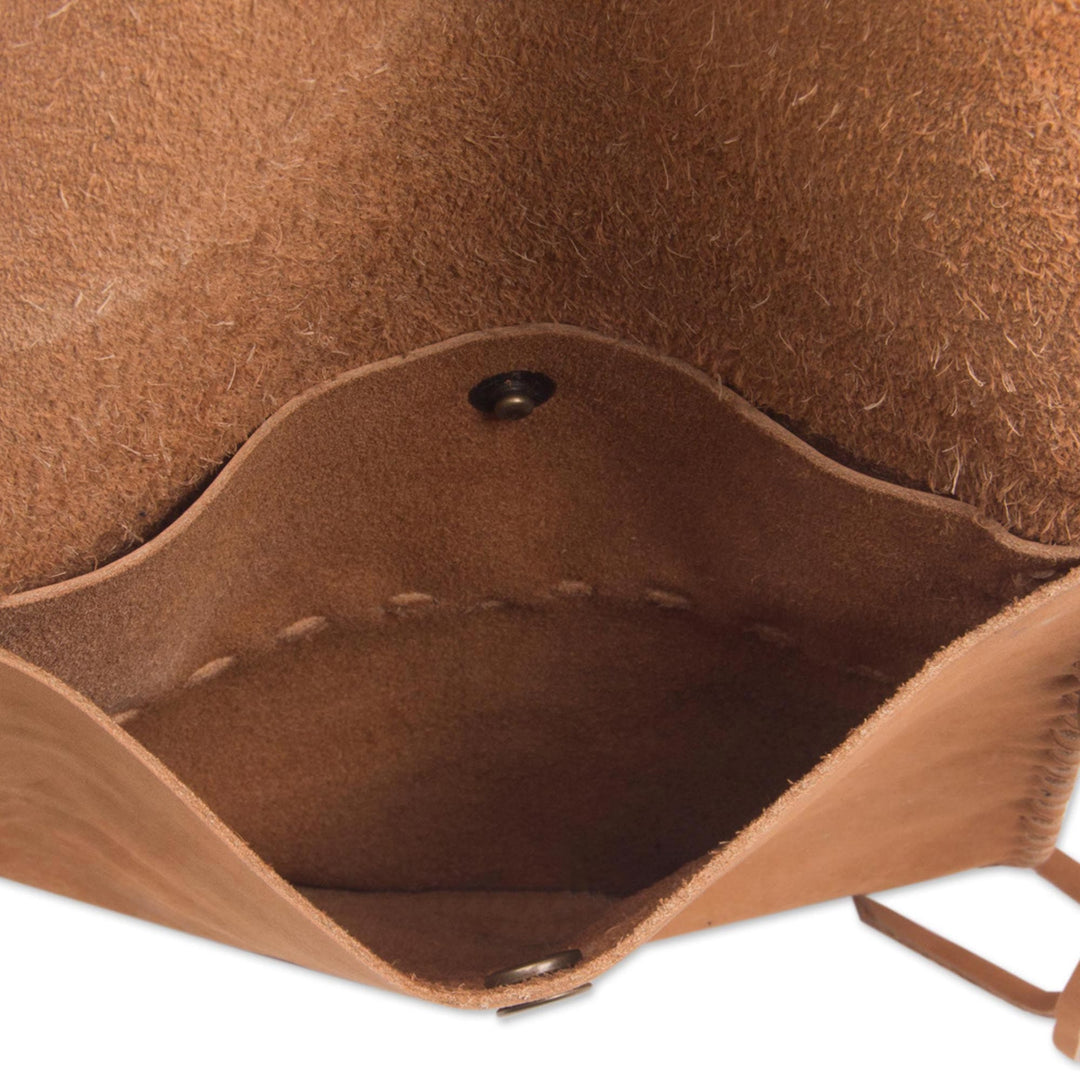 Handcrafted Leather Sling Handbag in Caramel from Bali - Caramel Travels