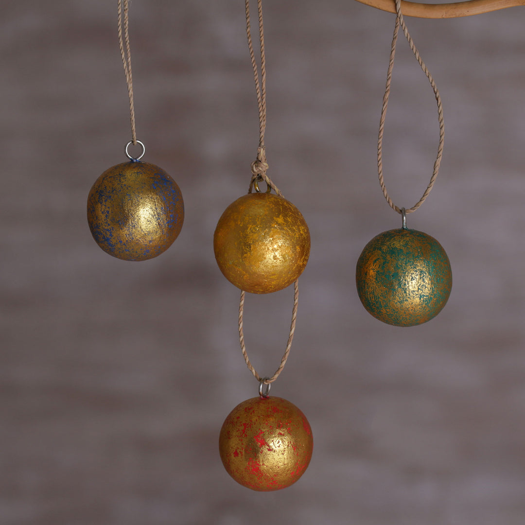 Four Round Gold Tone Albesia Wood Ornaments from Bali - Golden Baubles