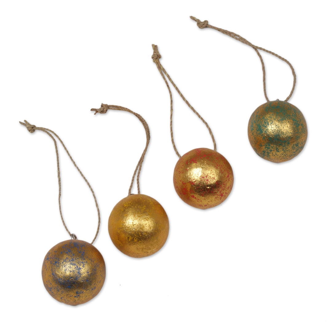 Four Round Gold Tone Albesia Wood Ornaments from Bali - Golden Baubles