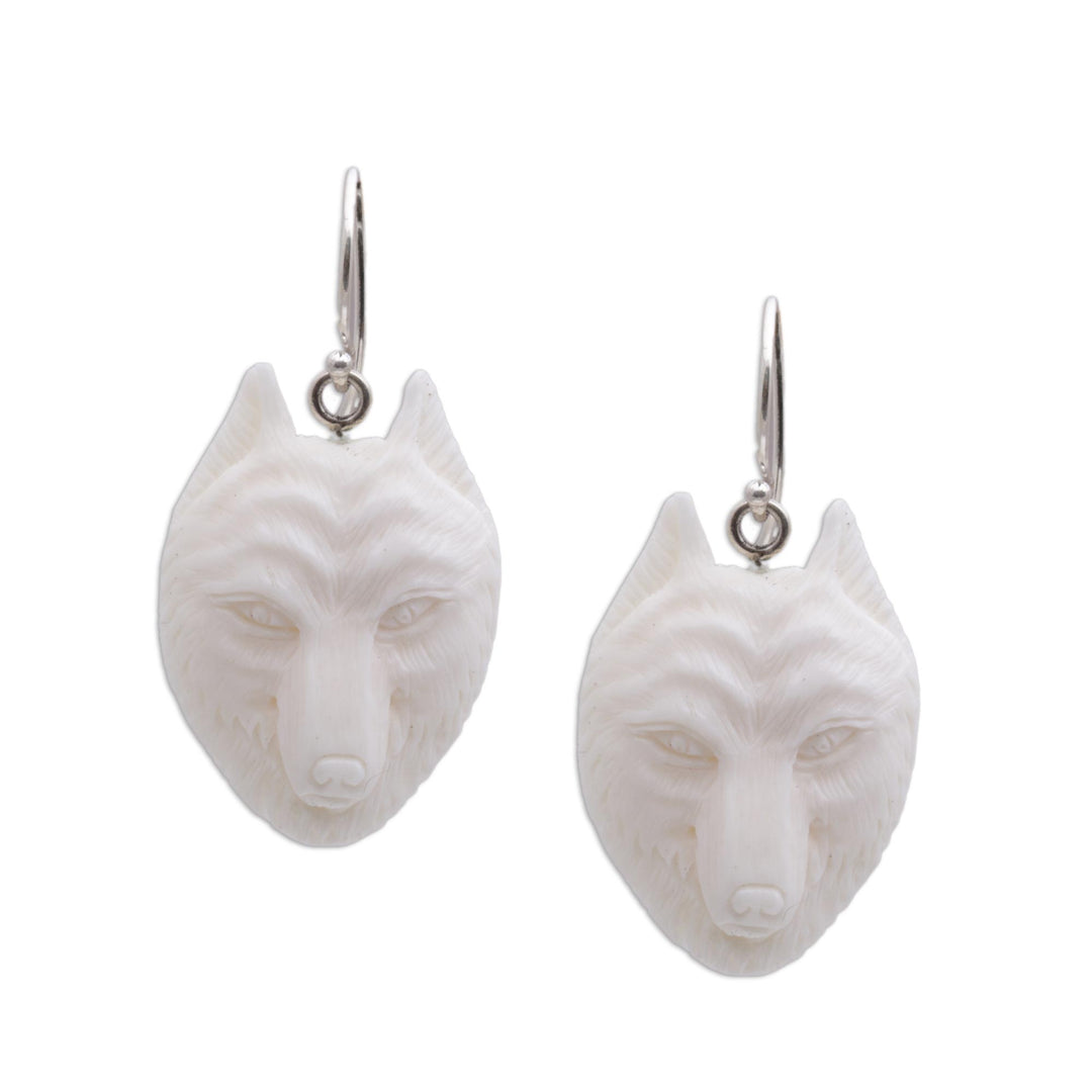 Handcrafted Bone Wolf Head Dangle Earrings from Bali - Wolf Pack