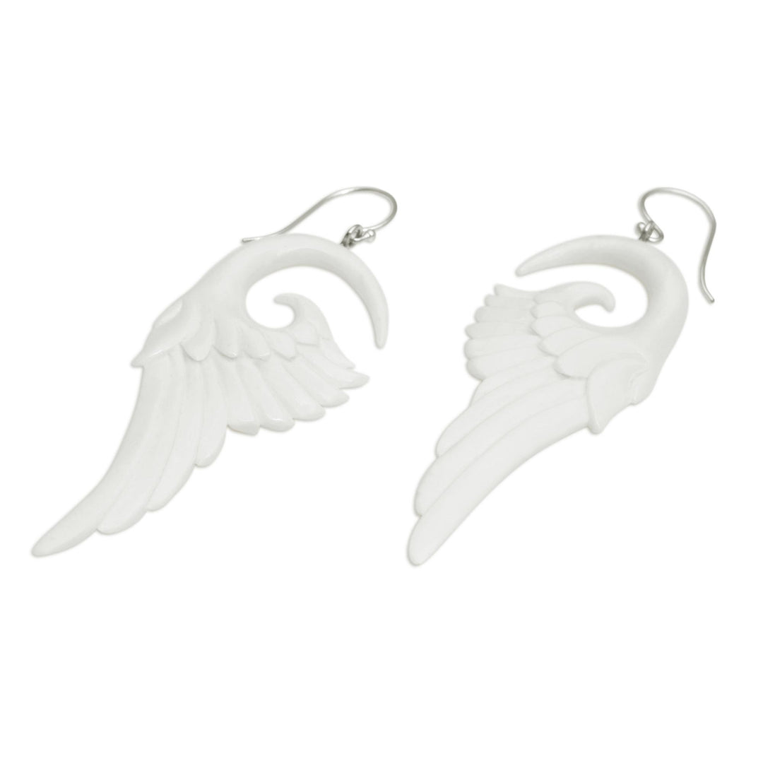 Handcrafted Bone Wing-Shaped Dangle Earrings from Bali - Swirling Wings