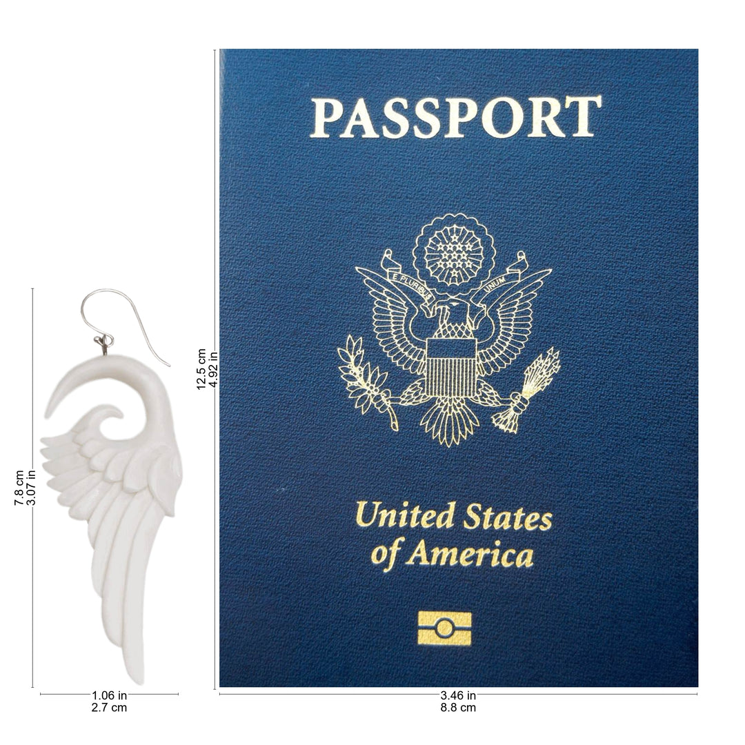 Handcrafted Bone Wing-Shaped Dangle Earrings from Bali - Swirling Wings