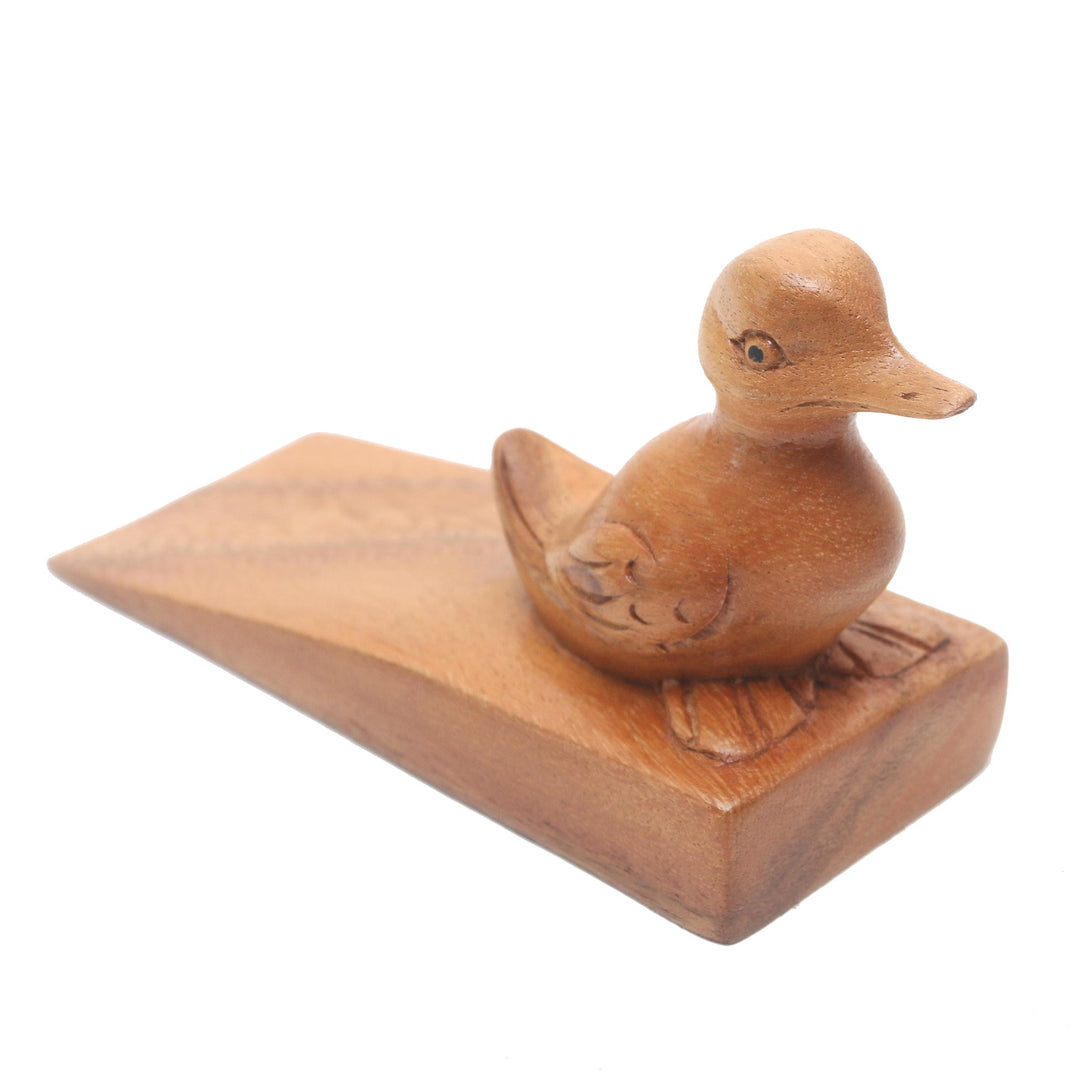 Handcrafted Suar Wood Duck Doorstop in Brown from Bali - Helpful Duck in Brown