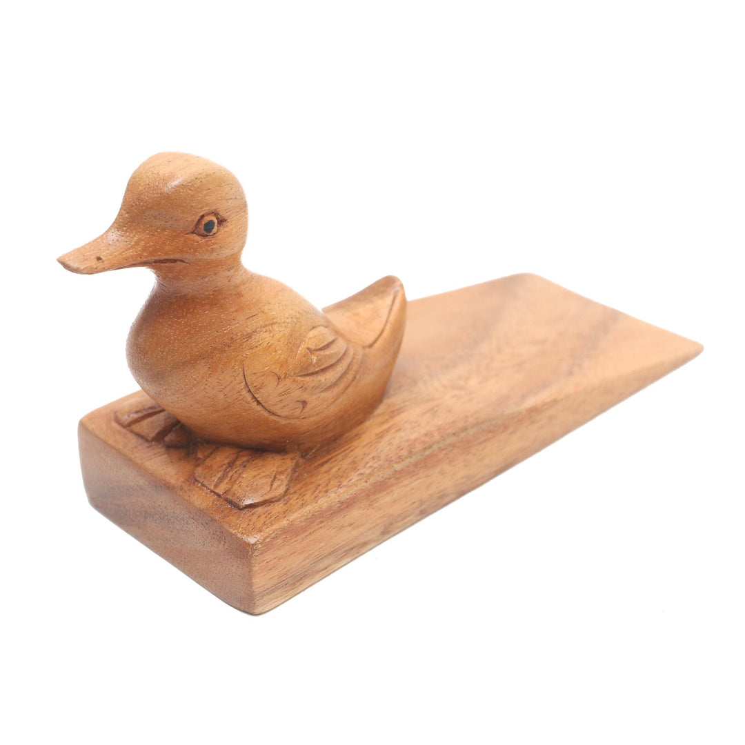 Handcrafted Suar Wood Duck Doorstop in Brown from Bali - Helpful Duck in Brown