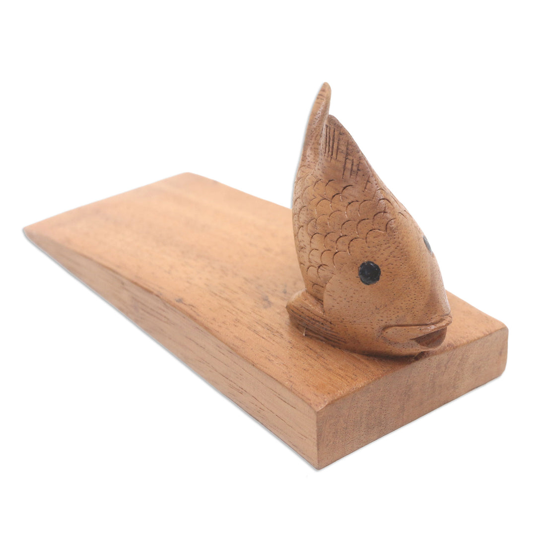 Handcrafted Suar Wood Fish Doorstop in Brown from Bali - Helpful Goldfish in Brown