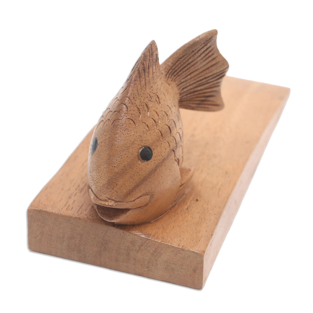 Handcrafted Suar Wood Fish Doorstop in Brown from Bali - Helpful Goldfish in Brown