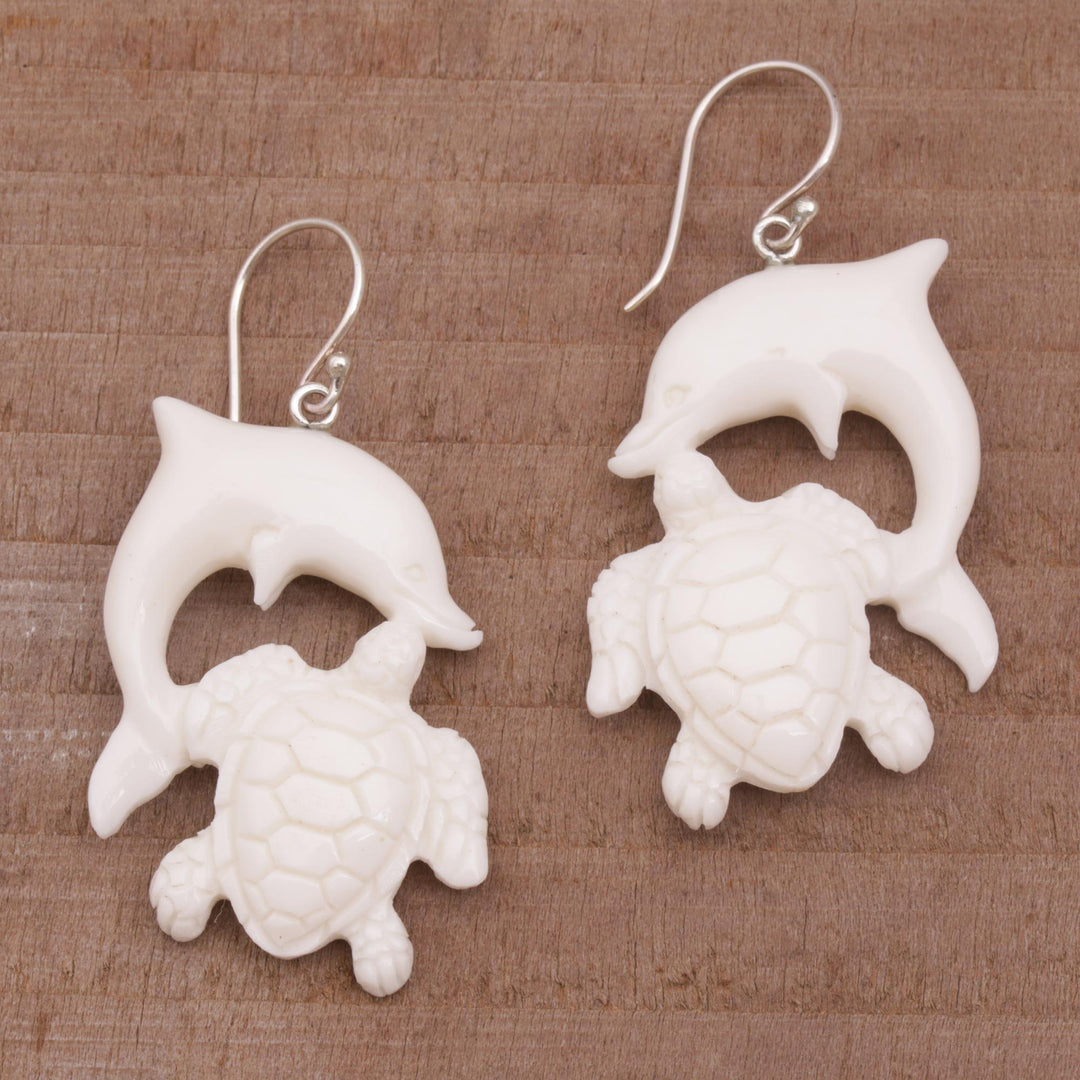 Bone Dangle Earrings with Dolphin and Tortoise Theme - Friends Among the Waves