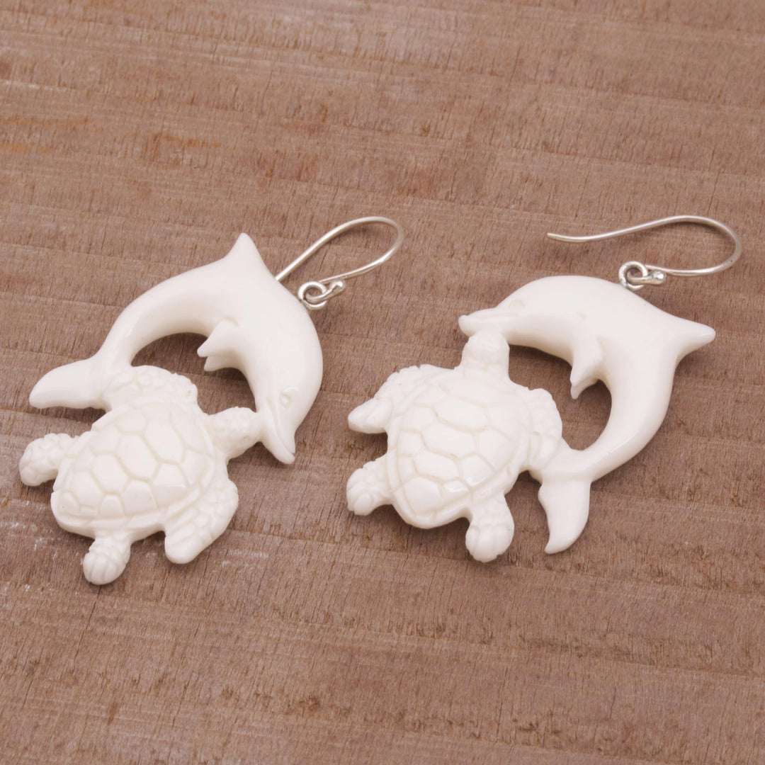 Bone Dangle Earrings with Dolphin and Tortoise Theme - Friends Among the Waves