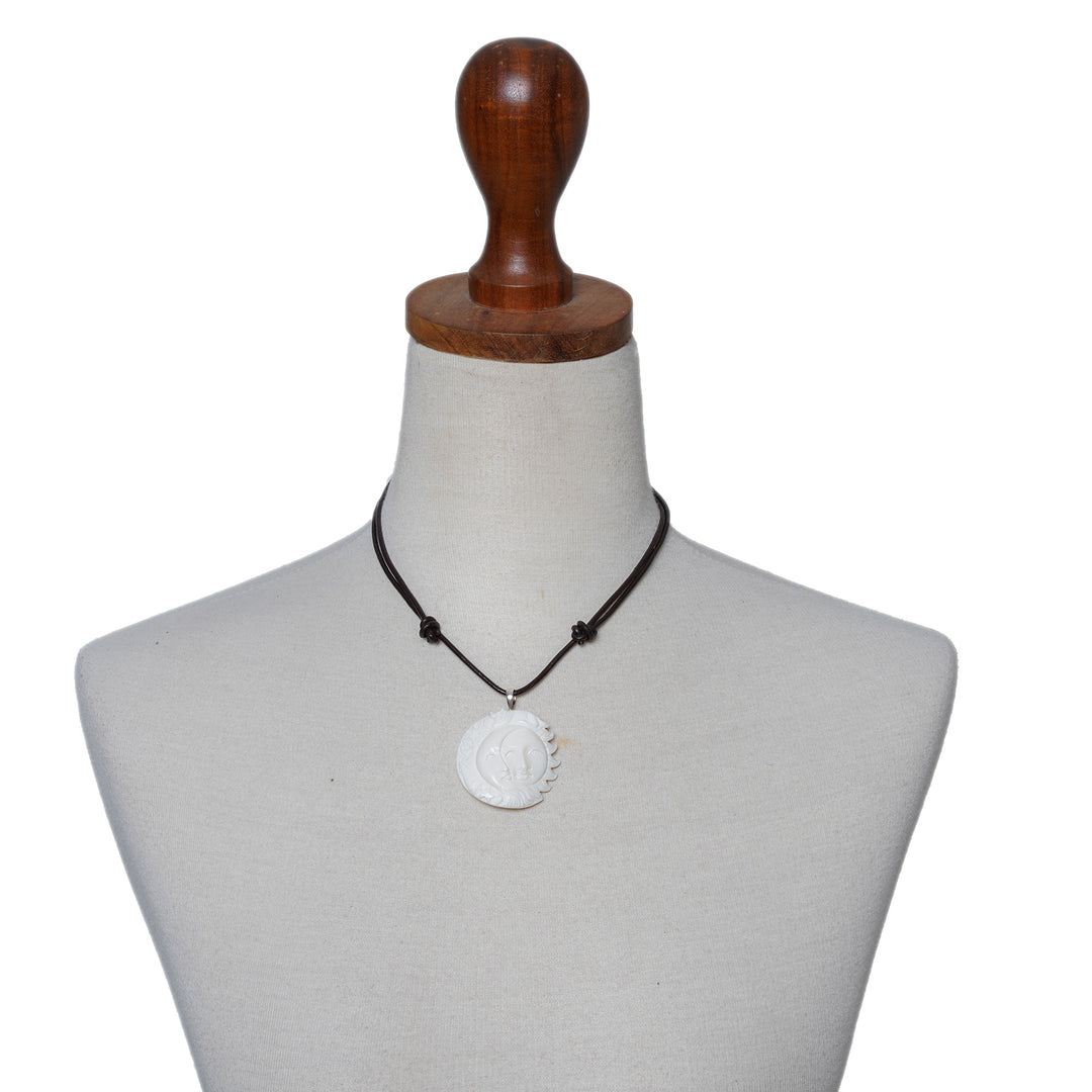 Handcrafted Sun and Moon Bone Pendant Necklace from Bali - Stellar Guardians
