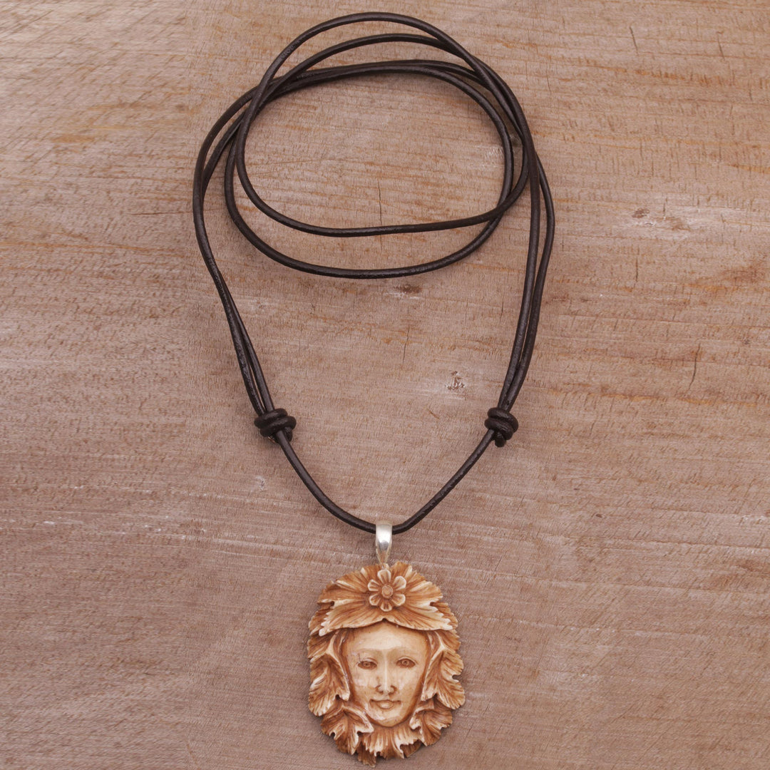 Handcrafted Floral Bone Pendant Necklace from Bali - Spying Jaka Tarub