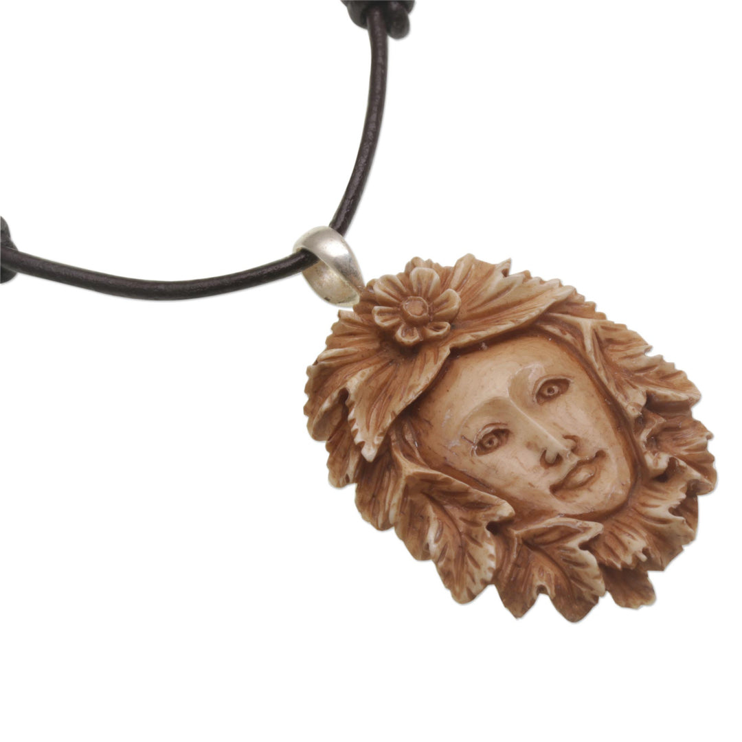 Handcrafted Floral Bone Pendant Necklace from Bali - Spying Jaka Tarub