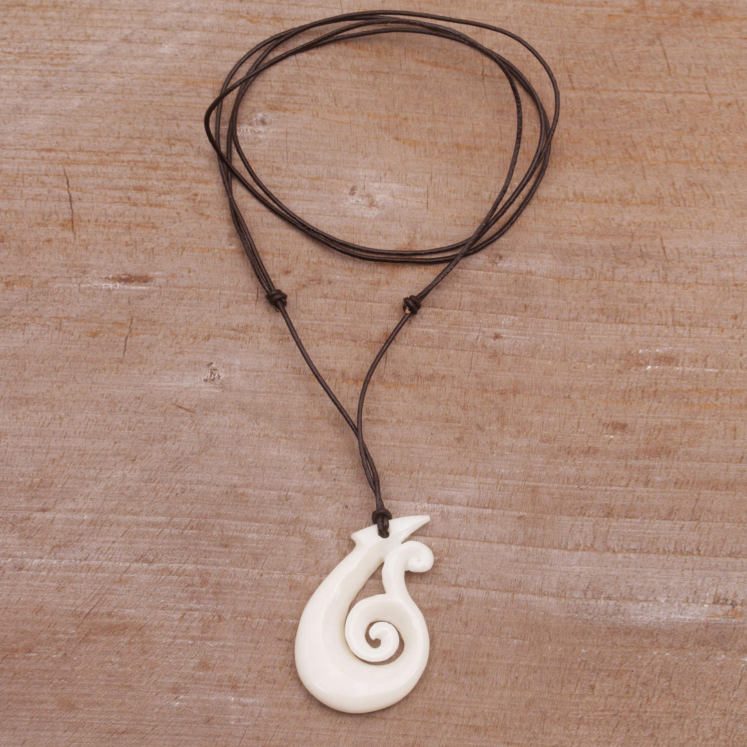 Handcrafted Swirl Motif Bone Pendant Necklace from Bali - Wavy Hook