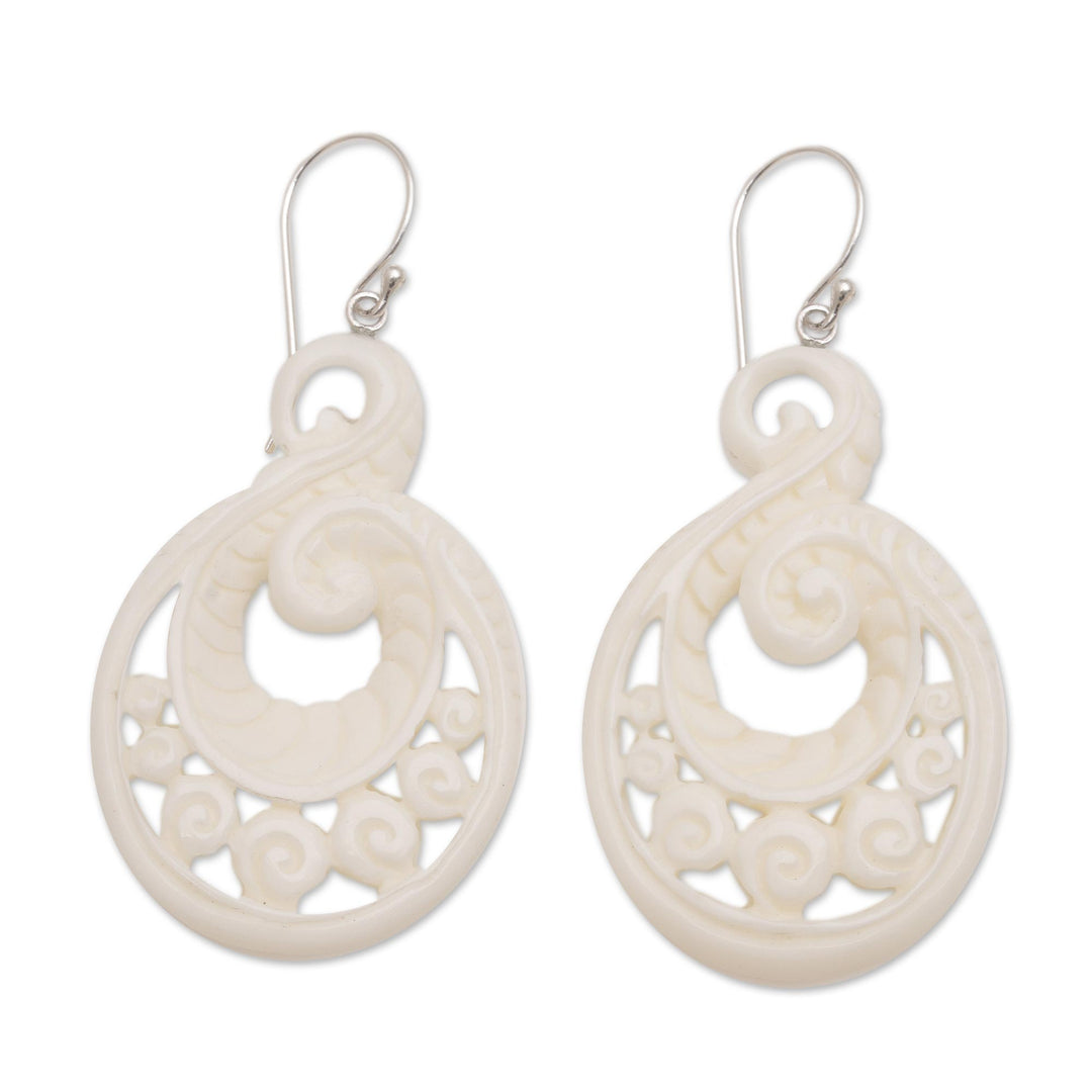 Handcrafted Bone Spiral Motif Dangle Earrings from Bali - Swirling Scales