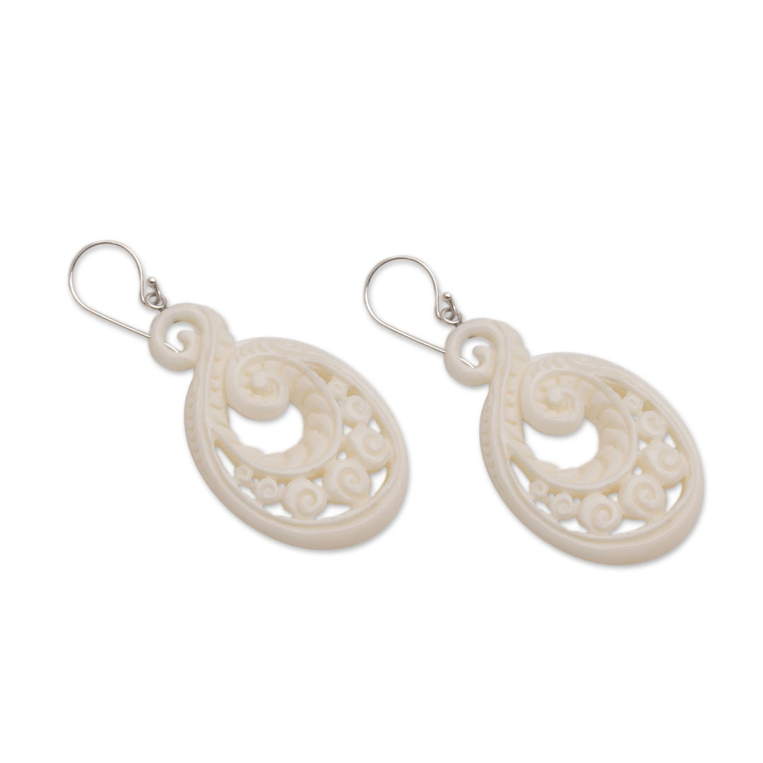 Handcrafted Bone Spiral Motif Dangle Earrings from Bali - Swirling Scales