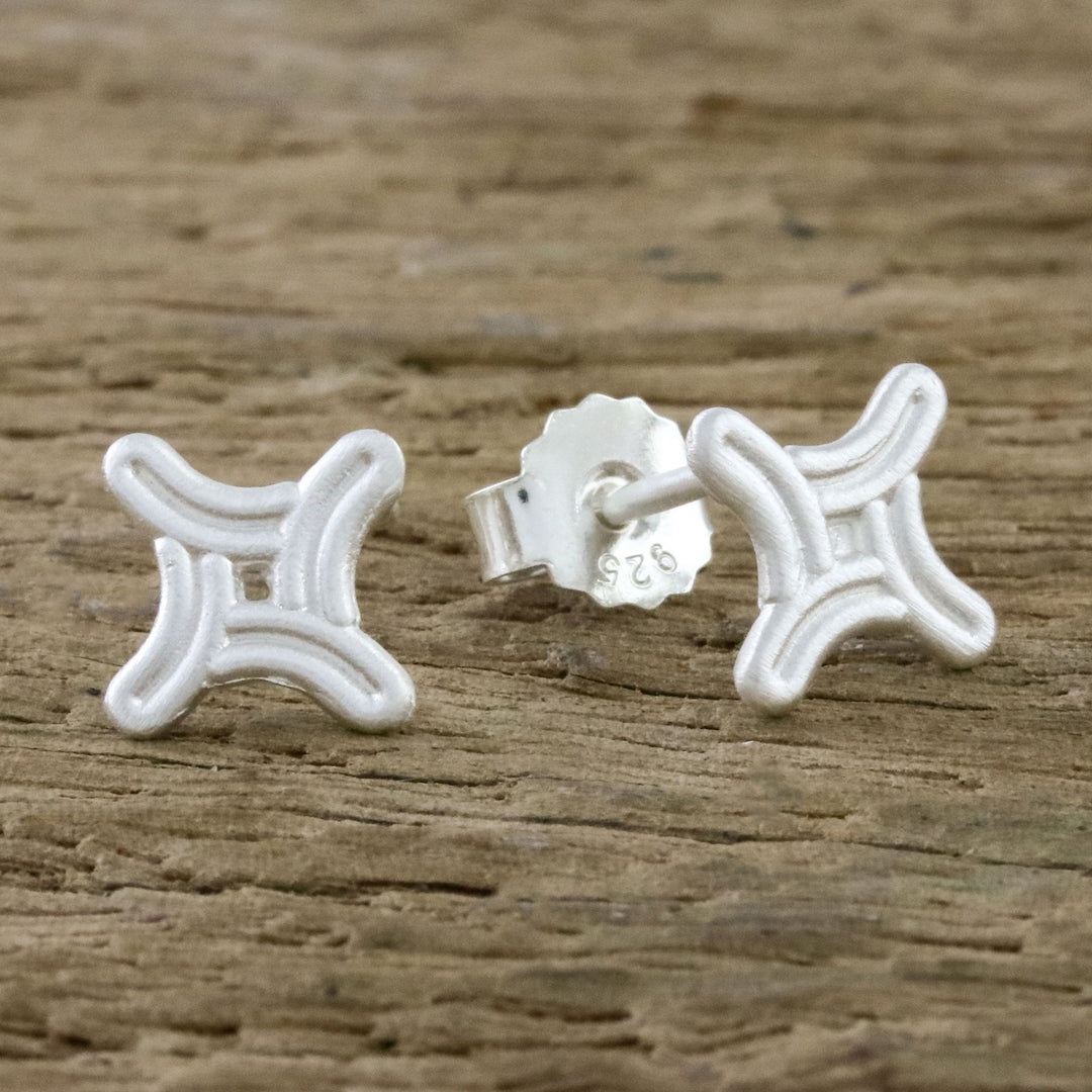 Curved Four-Sided Star Sterling Silver Stud Earrings - Winking Star