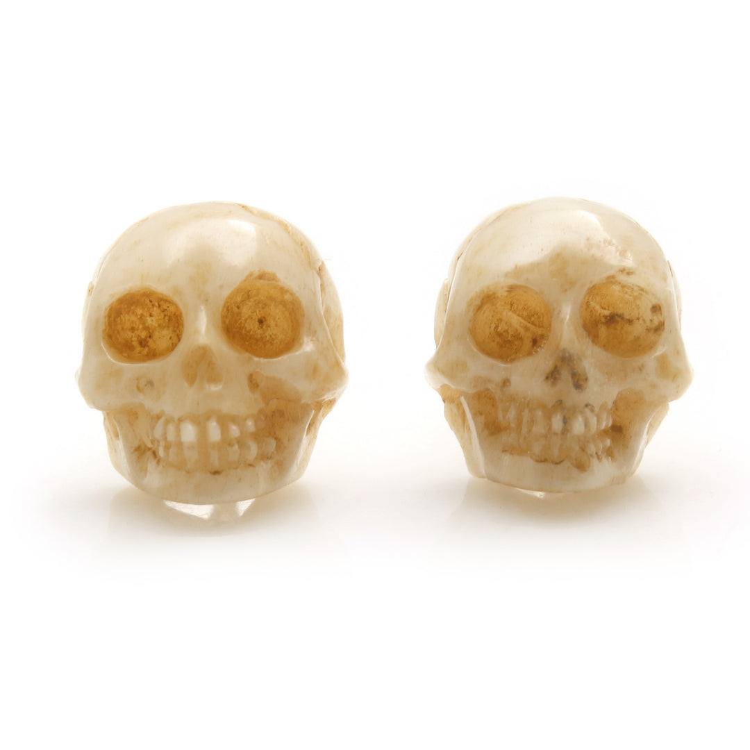 Hand-Carved Skull Bone Stud Earrings from Bali - Faces of Trunyan