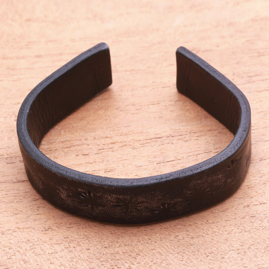 Subtle Star Motif Black Leather Cuff Bracelet from Bali - Hidden Stars in Black