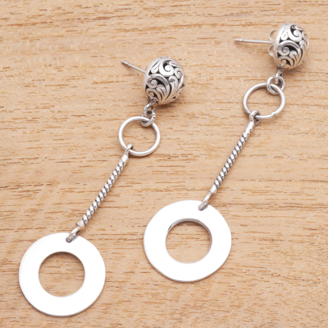 Round Sterling Silver Dangle Earrings from Java - Loop Gleam