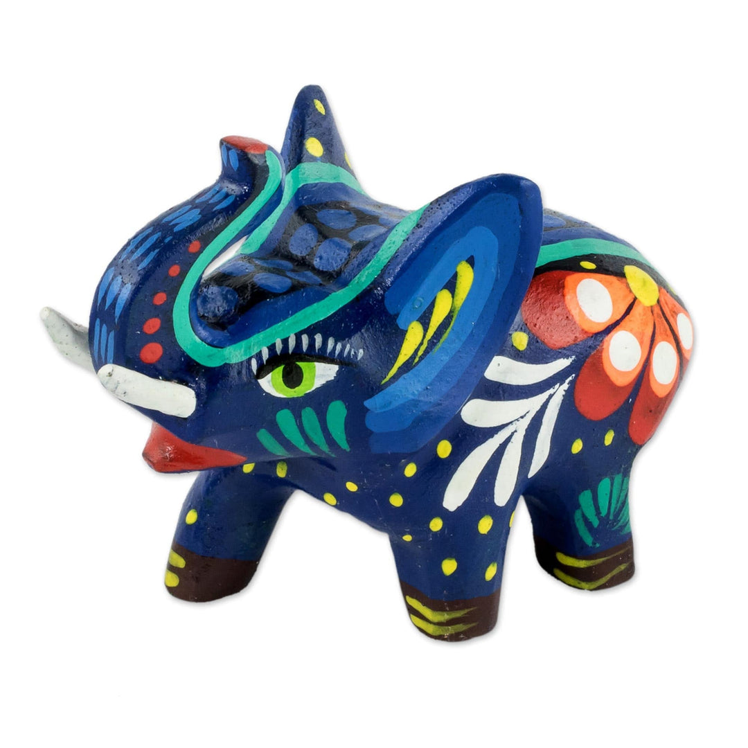 Small Wood Hand Painted Elephant Figurine - Unstoppable Force