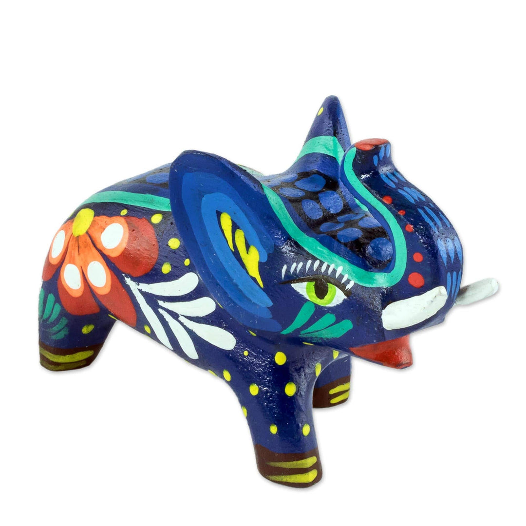Small Wood Hand Painted Elephant Figurine - Unstoppable Force