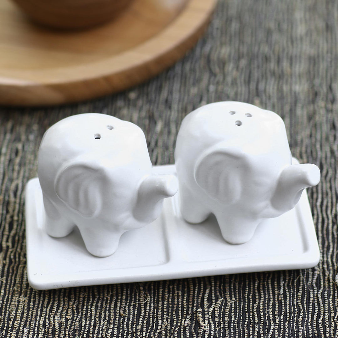 Eager Elephants in White