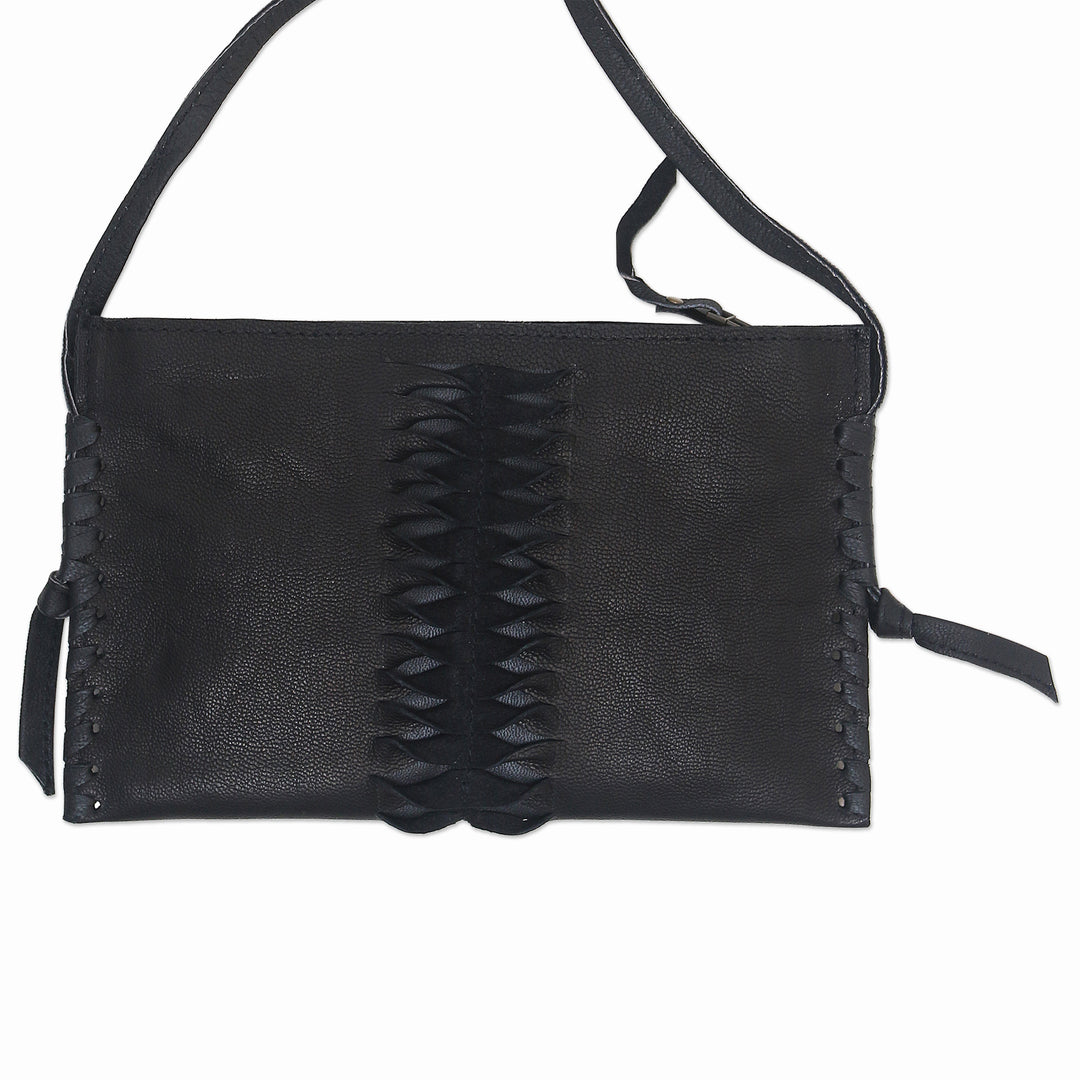Hand-Cut Leather Sling Bag from Bali - Dark Center