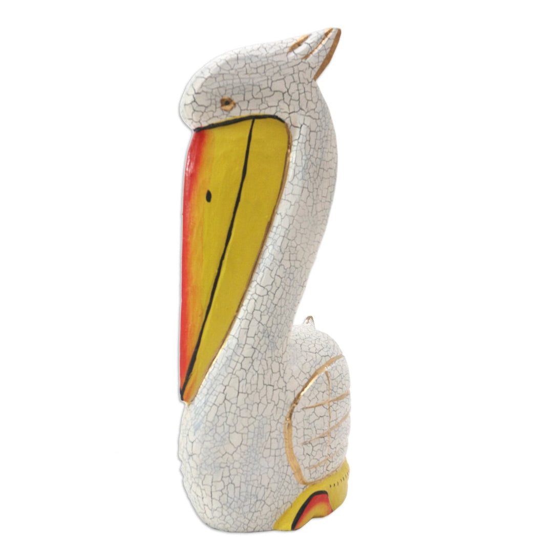 Hand Crafted Albesia Wood Pelican Statuette - Pelican Crossing in White