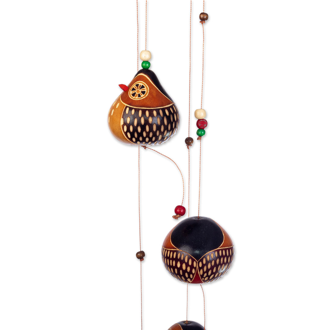 Hand-painted and Owl-themed Dried Gourd Mobile from Peru - Magical Owls