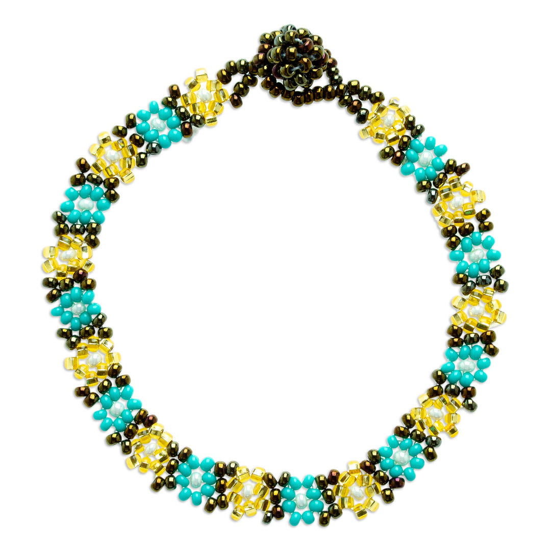 Handcrafted Glass Beaded Bracelet with Floral Motifs - Turquoise Sparks