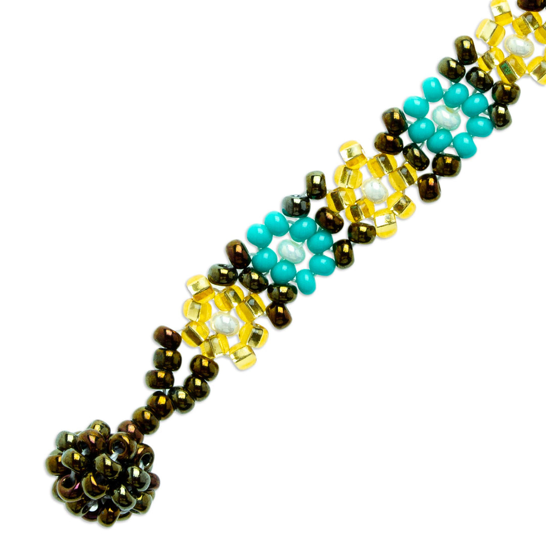Handcrafted Glass Beaded Bracelet with Floral Motifs - Turquoise Sparks