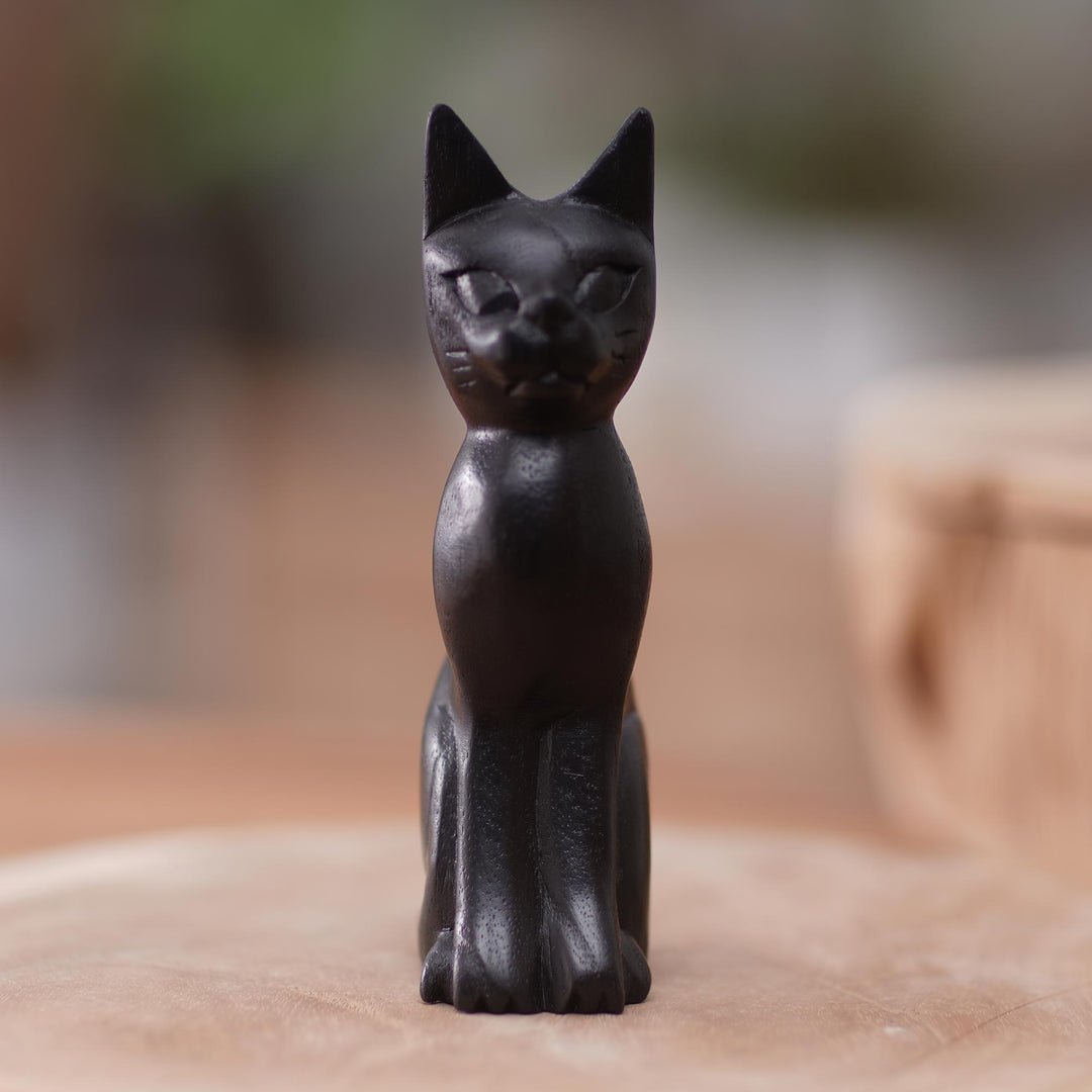 Black Cat Sculpture Hand-Carved from Jempinis Wood in Bali - Cunning Black Cat