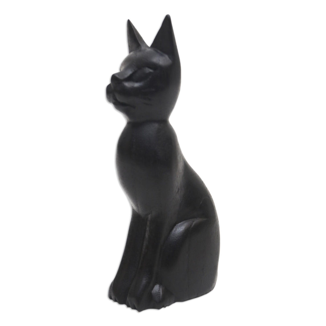 Black Cat Sculpture Hand-Carved from Jempinis Wood in Bali - Cunning Black Cat